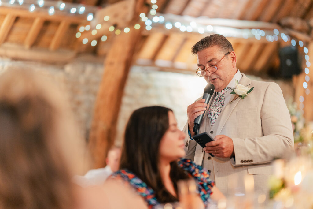 A man holding a microphone.